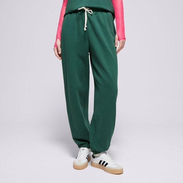 Spodnie NEW BALANCE SPODNIE ATHLETICS FRENCH TERRY JOGGER (WP41513NWG) Zielony